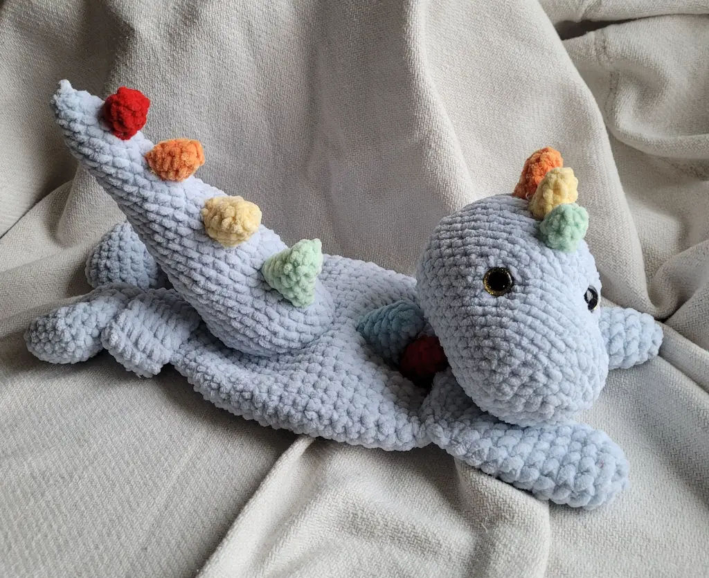 Dino_Calin_gris_bleu.webp
